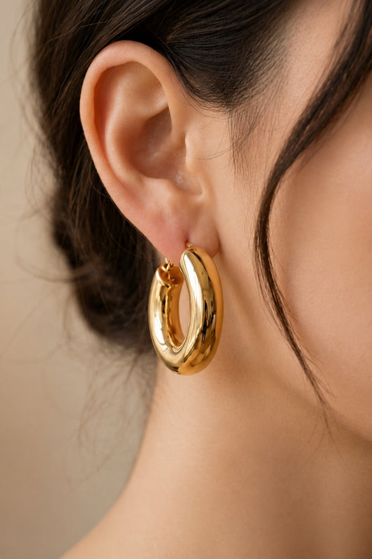 Chunky Gold Tone C-Shaped Hoop