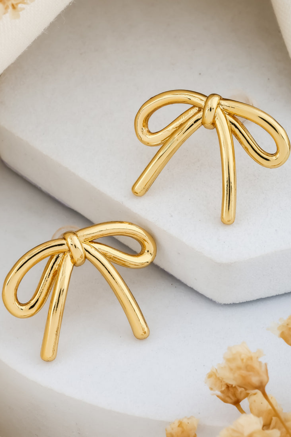 Elegant Gold Bow Stud