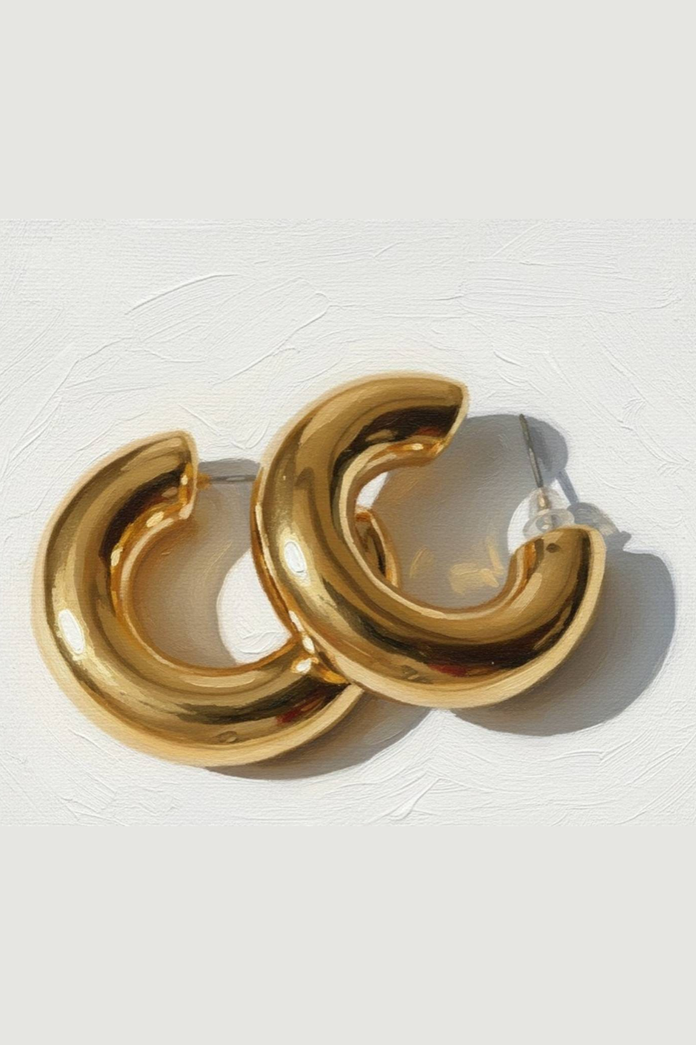 Chunky Gold Tone C-Shaped Hoop