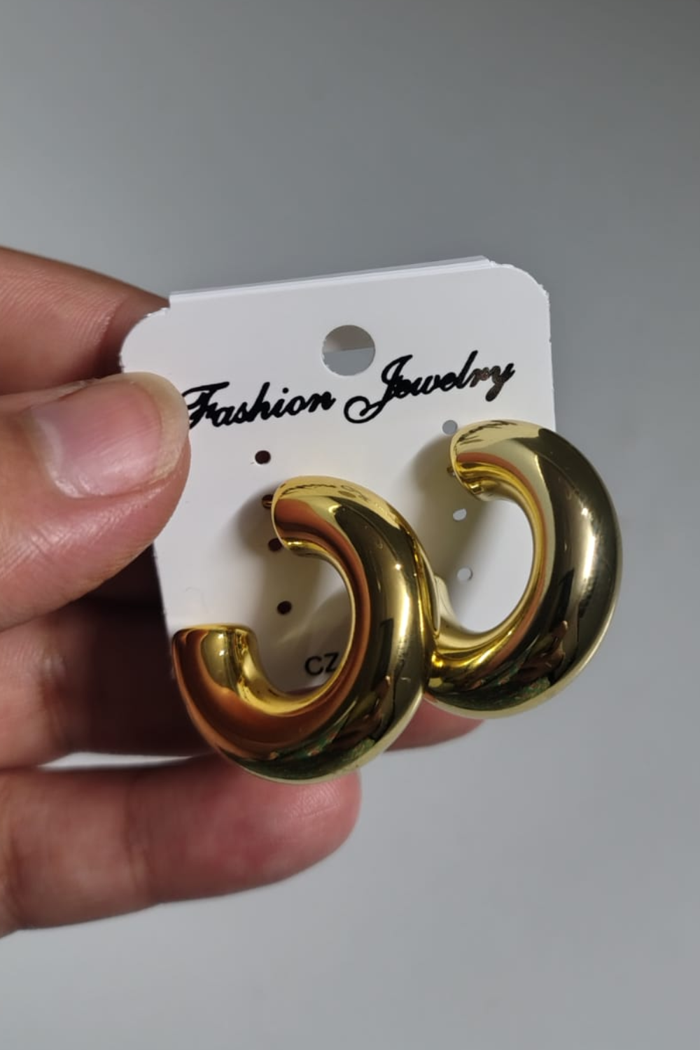 Chunky Gold Tone C-Shaped Hoop