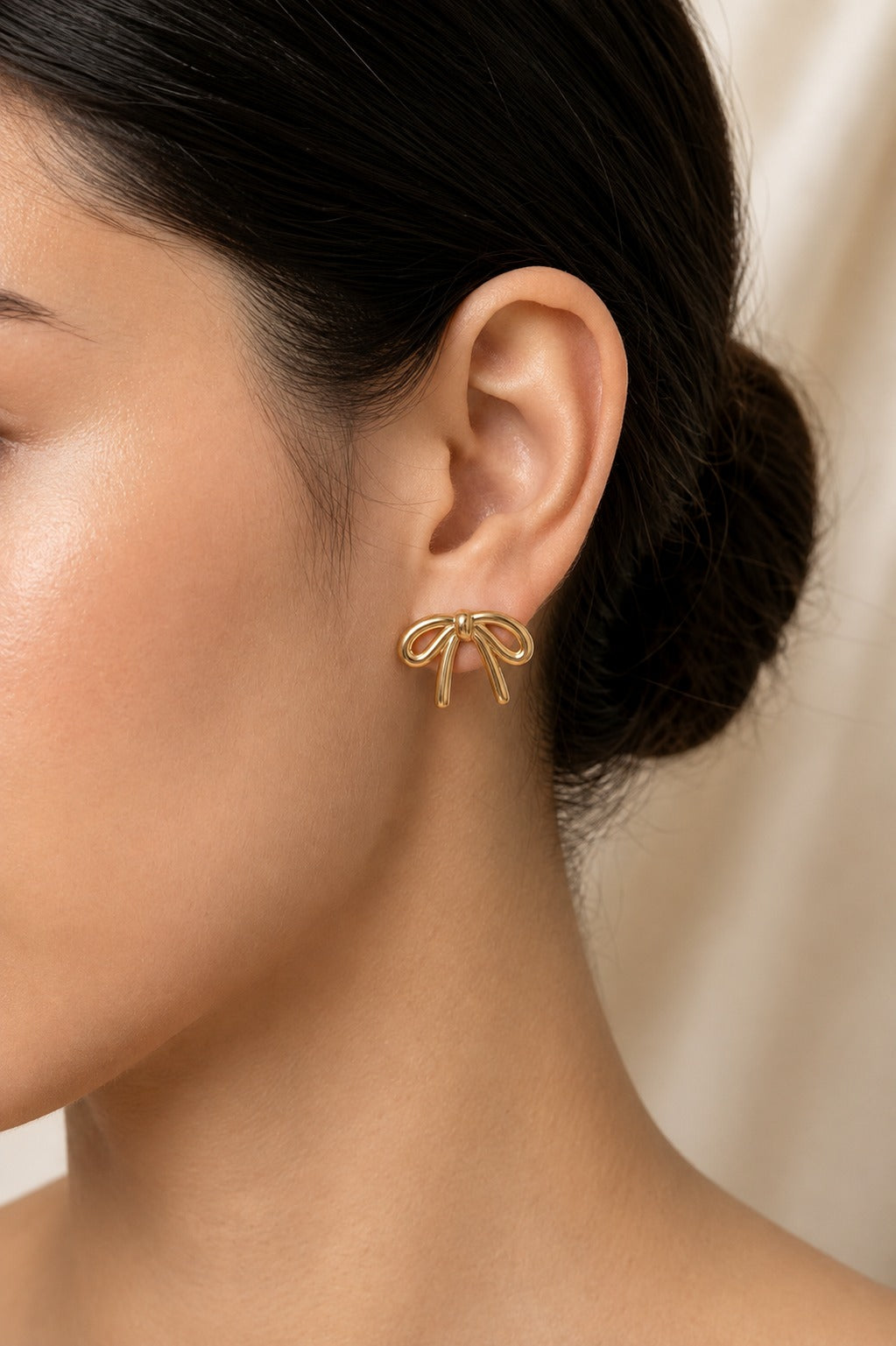Elegant Gold Bow Stud